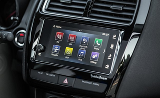 Illustration for article titled This is probably the most laziest way to install an infotainment system.